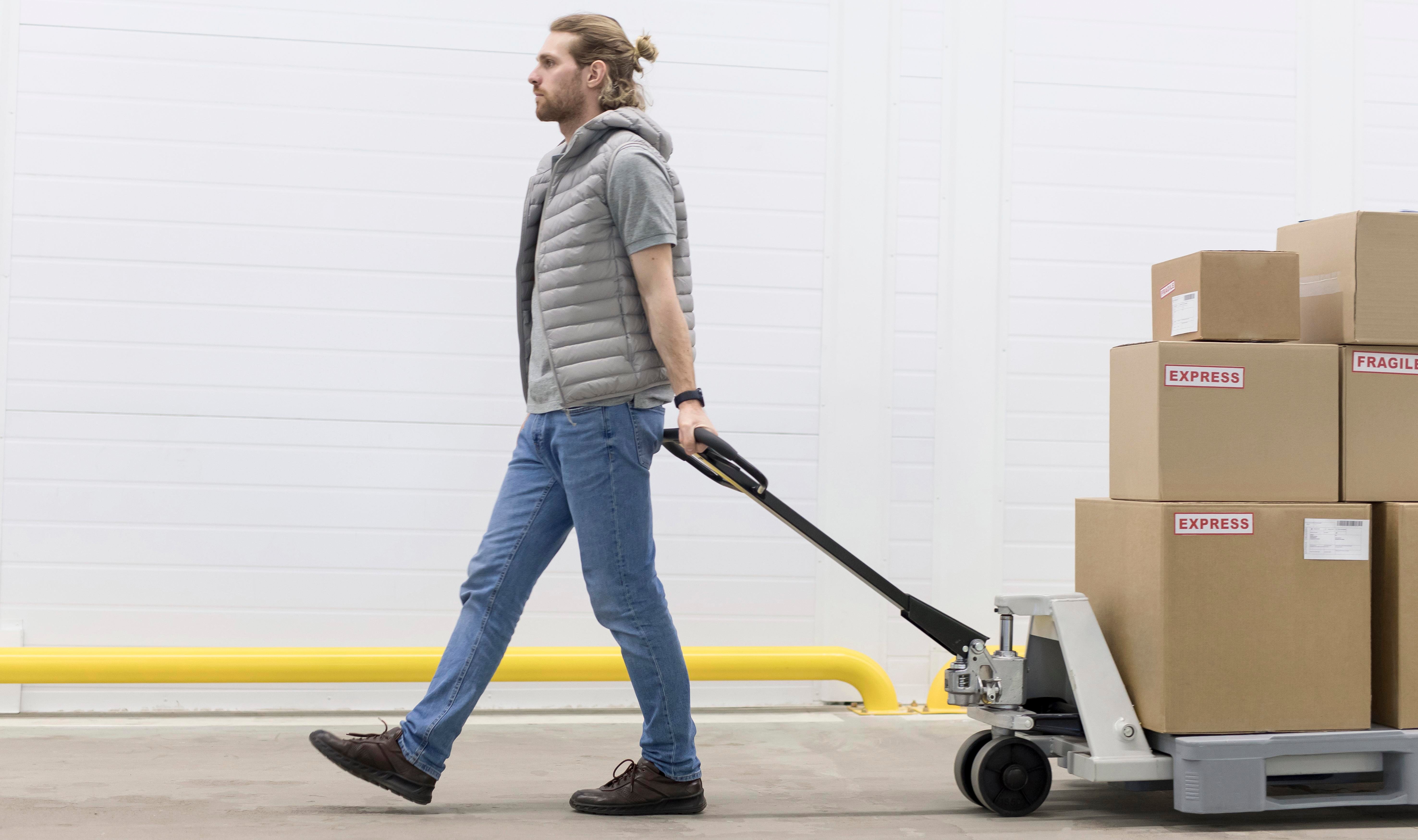 full-shot-man-carrying-boxes