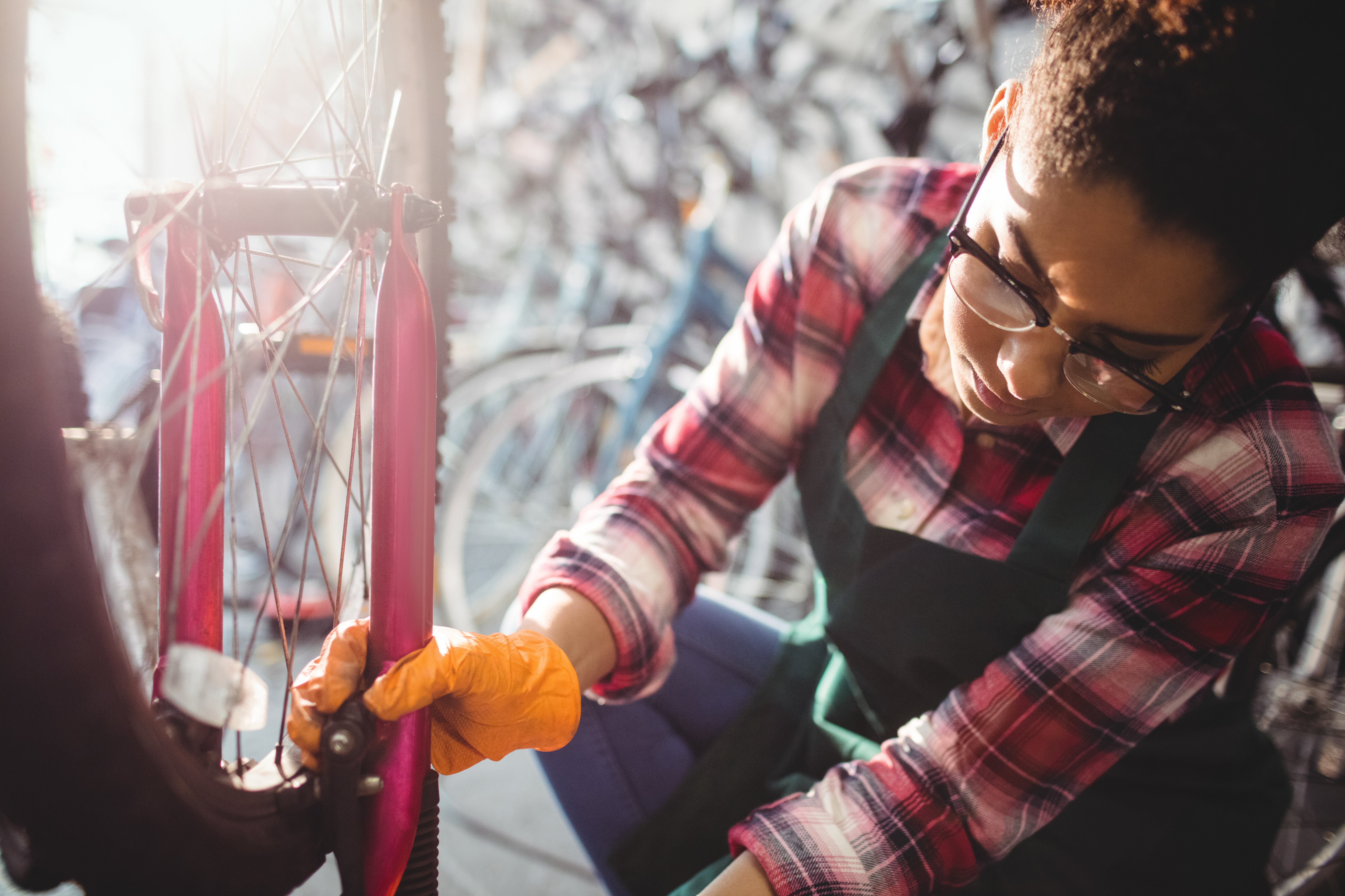 mechanic-repairing-bicycle