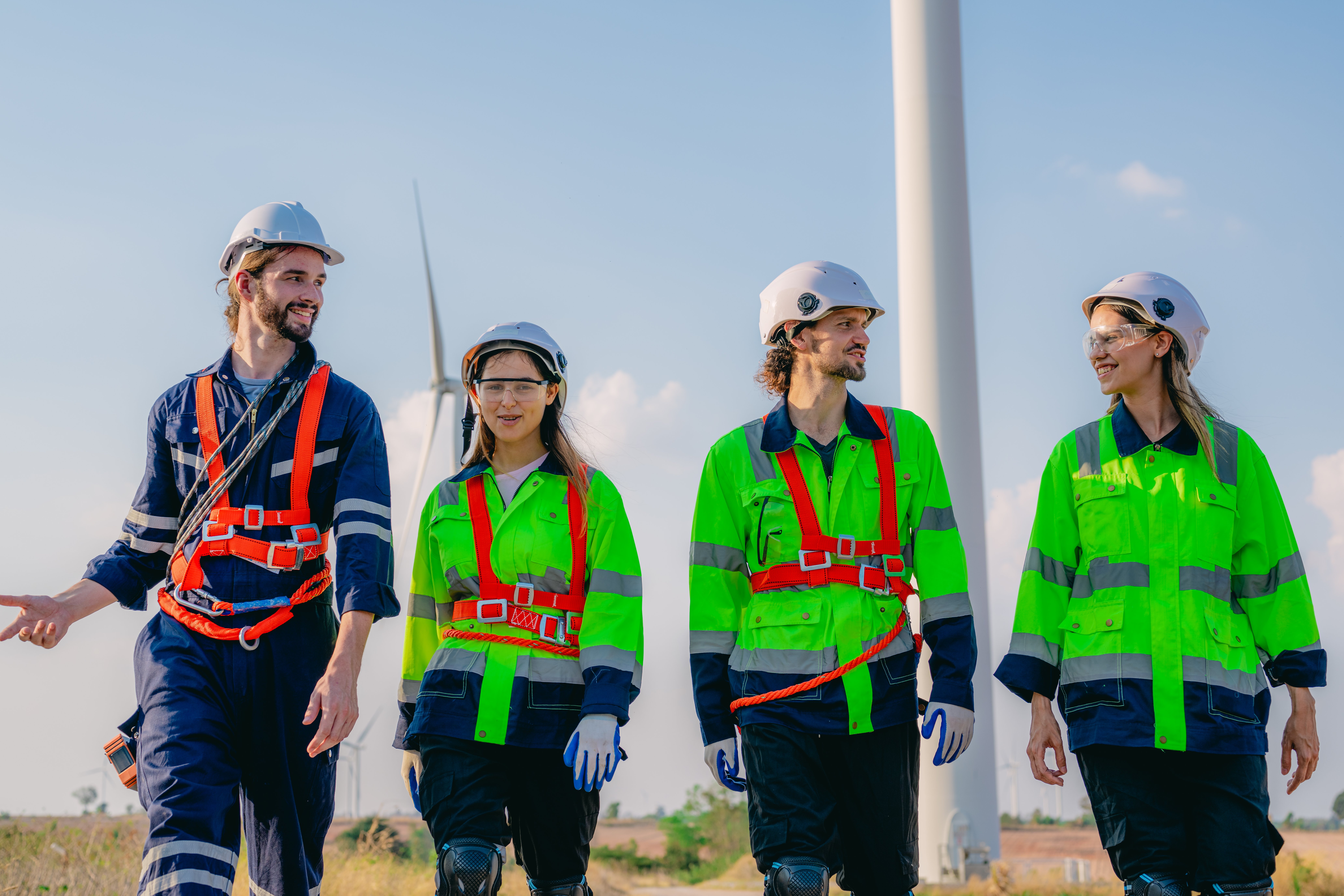 professional-engineer-technician-working-outdoor-wind-turbine-field
